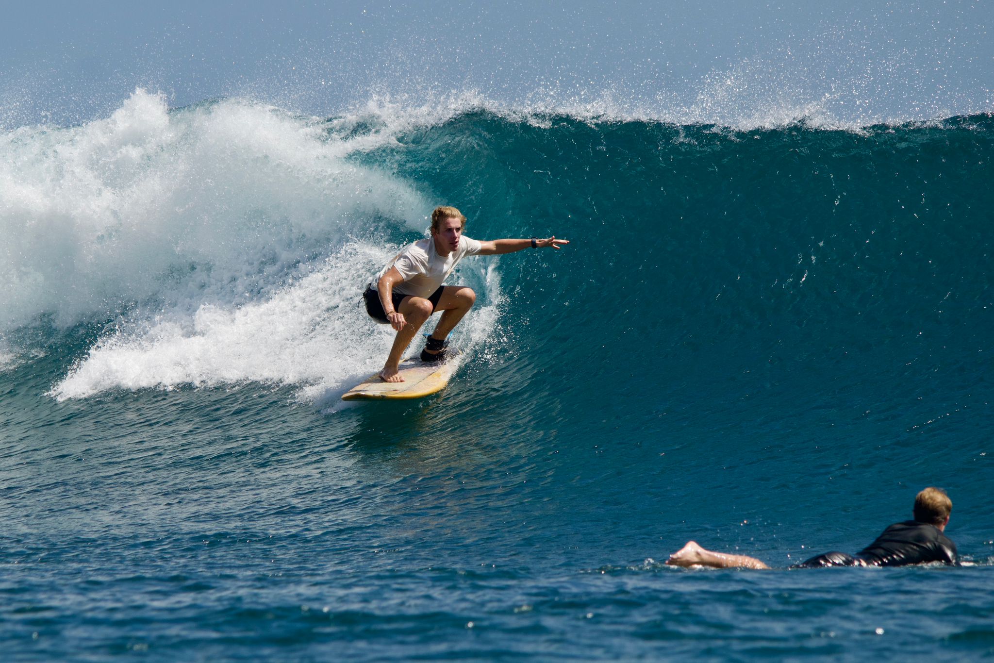 Advanced surfing on Lombok reef breaks