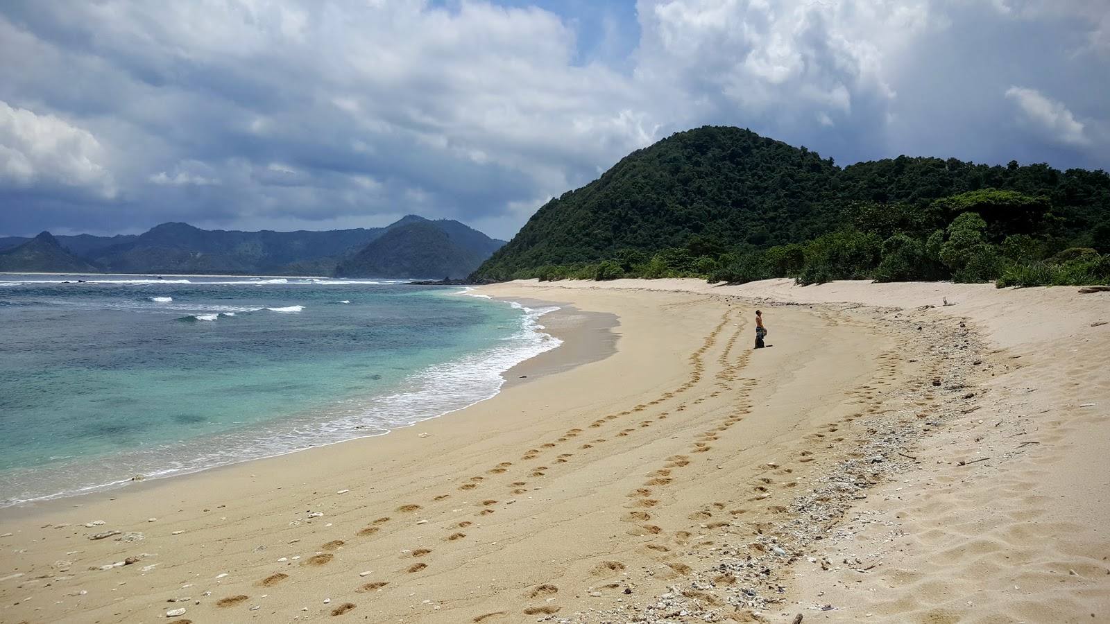 Pristine Mawi Beach with white sand and turquoise water